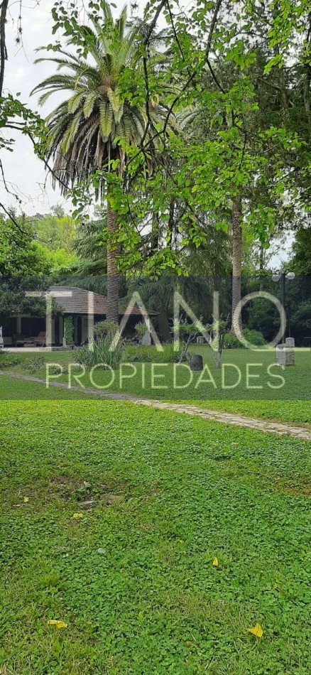 Arbolada casa de campo